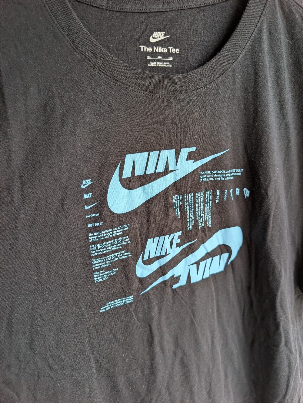 Nike Men’s Black Short Sleeve Tee with Light Blue Graphic - Picture 2 of 4
